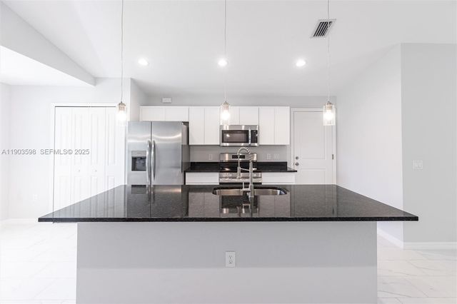 2005 Rosa Court, Lehigh Acres, FL 33972
