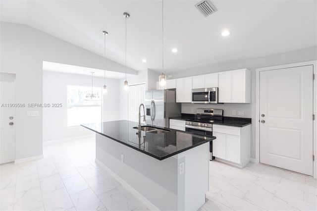 2005 Rosa Court, Lehigh Acres, FL 33972