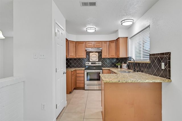 2414 Heather Ridge Court, Webster, TX 77598