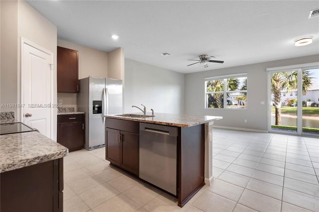 1761 Lindley St, Mangonia Park, FL 33407