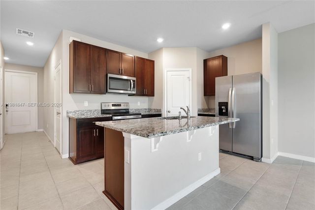 1761 Lindley St, Mangonia Park, FL 33407