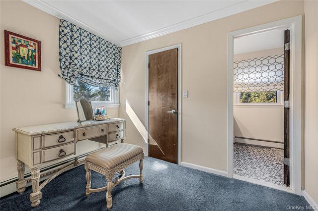 18 Woodland Road, Roslyn, NY 11576