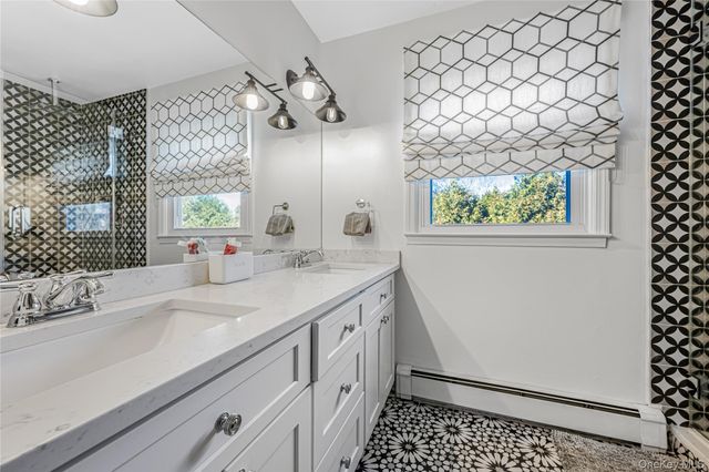 18 Woodland Road, Roslyn, NY 11576