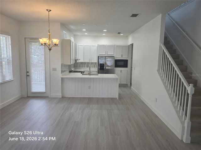13825 BENAVENTE AVENUE, Orlando, FL 32827