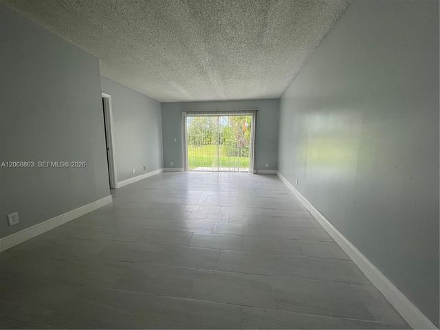 10169 Twin Lakes Drive 23-E, Coral Springs, FL 33071