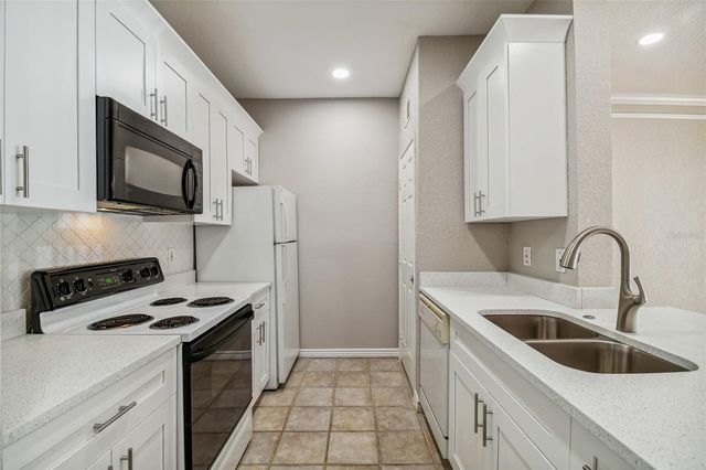 4307 BAYSIDE VILLAGE DRIVE 104, Tampa, FL 33615