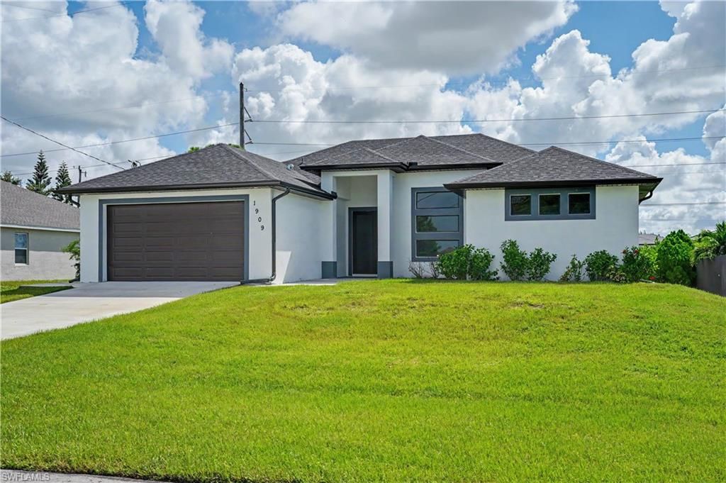 1909 NW 24th PL, CAPE CORAL, FL 33993 — exterior