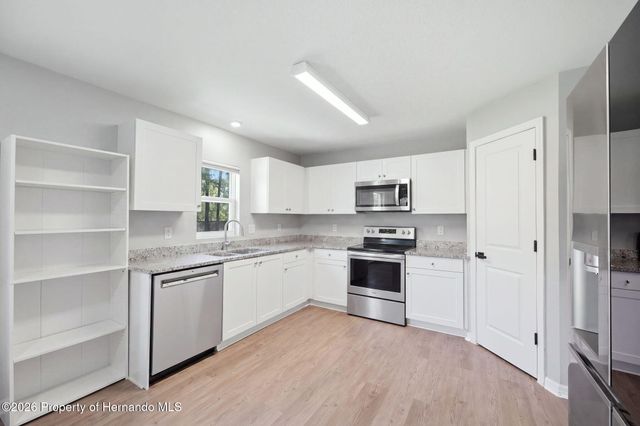 12145 Peregrine Falcon Avenue, Weeki Wachee, FL 34614
