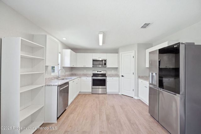 12145 Peregrine Falcon Avenue, Weeki Wachee, FL 34614
