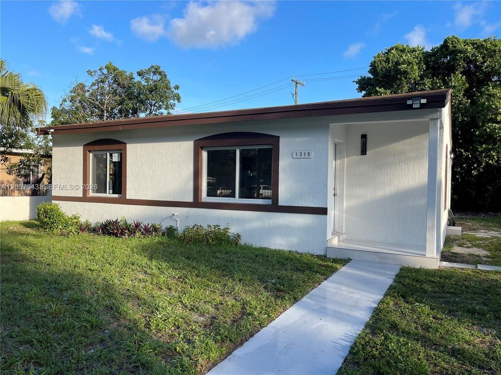 Image 2 of property listing at 1310 Sharazad Blvd, Opa-locka, FL 33054