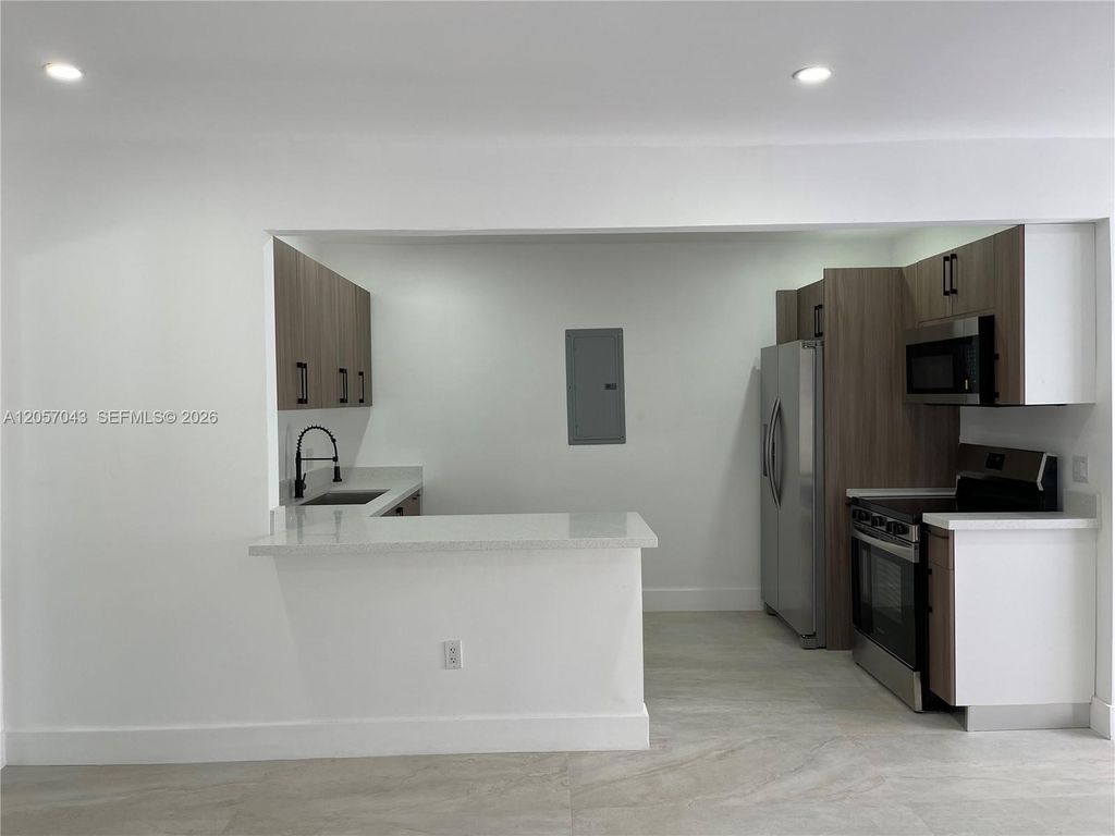 Image 8 of property listing at 1310 Sharazad Blvd, Opa-locka, FL 33054