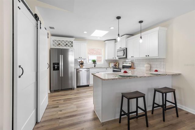 13 CEDARWOOD COURT, Palm Coast, FL 32137