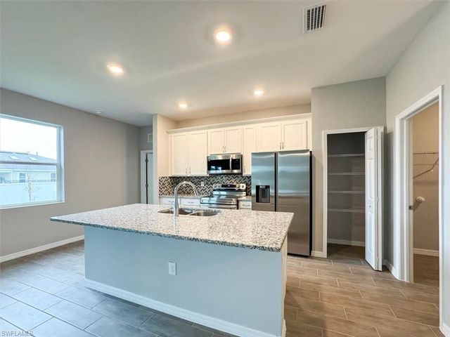 512 NW 25th AVE, Cape Coral, FL 33993
