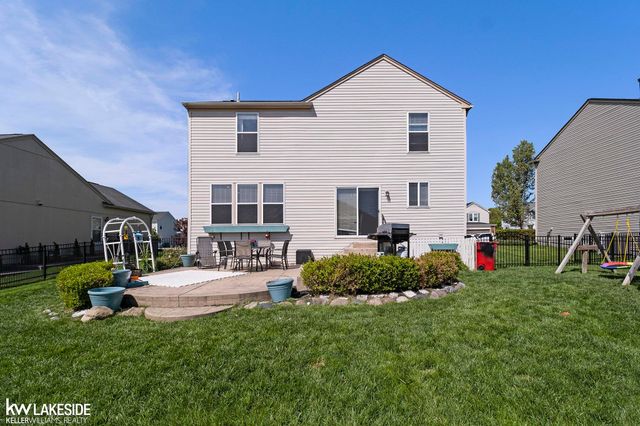 56546 Winding Creek Drive, Macomb Twp, MI 48042