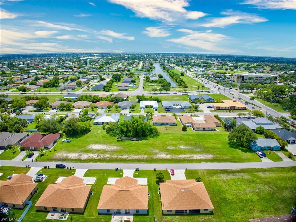 1302 SE 8th PL, CAPE CORAL, FL 33990 — exterior