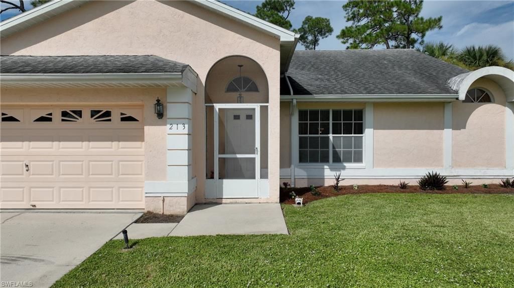213 Maple AVE N, Lehigh Acres, FL 33936