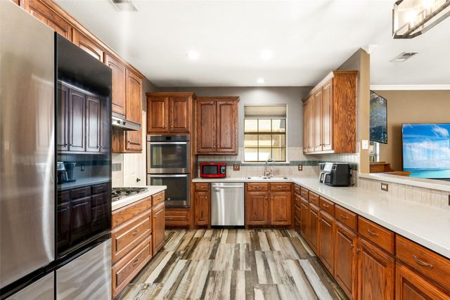 9702 October Glory Lane, Rowlett, TX 75089