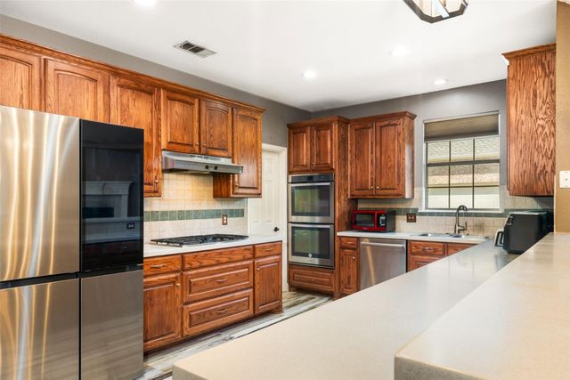 9702 October Glory Lane, Rowlett, TX 75089