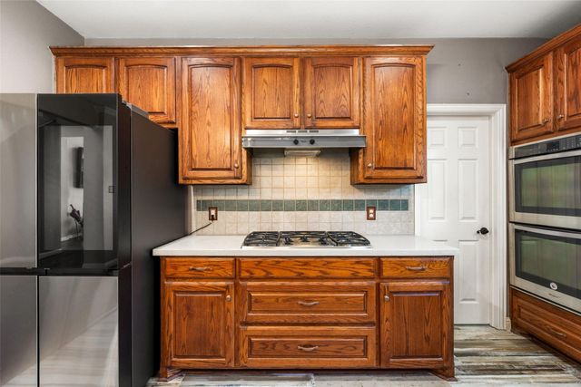 9702 October Glory Lane, Rowlett, TX 75089