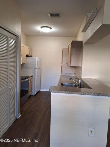 7800 POINT MEADOWS Drive, 116, Jacksonville, FL 32256