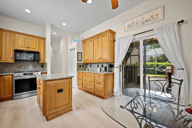 21 Grand Bay Circle, Juno Beach, FL 33408