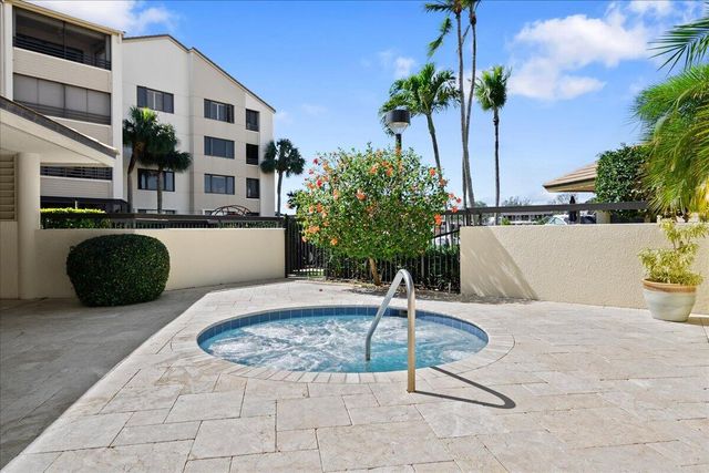 21 Grand Bay Circle, Juno Beach, FL 33408