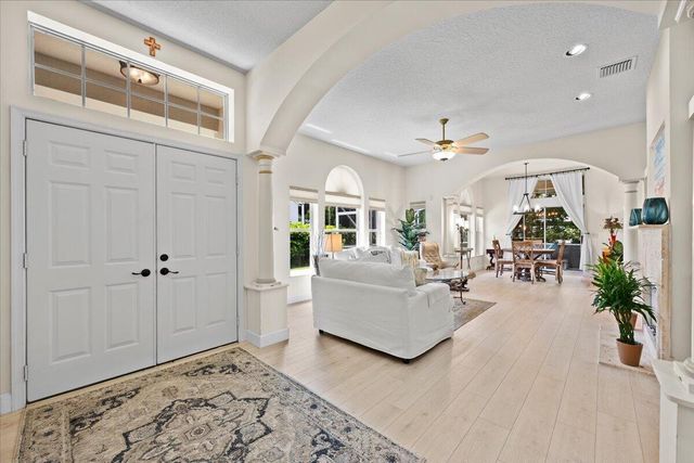 21 Grand Bay Circle, Juno Beach, FL 33408