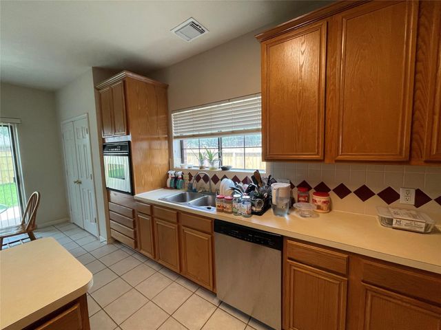 16211 Quiet Canyon Court, Friendswood, TX 77546