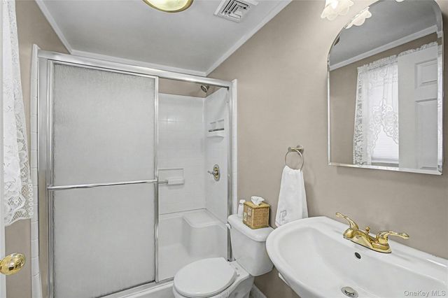 9 S Pond Trail, Ridge, NY 11961