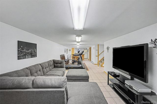 9 S Pond Trail, Ridge, NY 11961