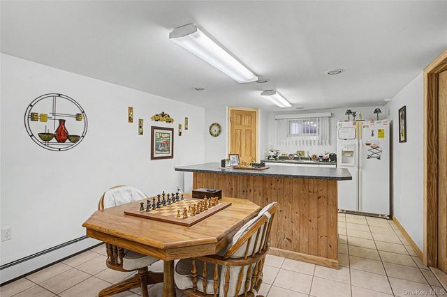 9 S Pond Trail, Ridge, NY 11961