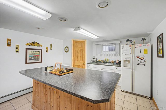 9 S Pond Trail, Ridge, NY 11961