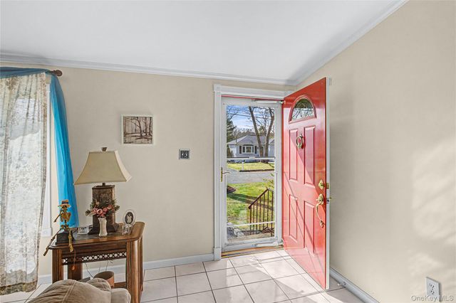 9 S Pond Trail, Ridge, NY 11961