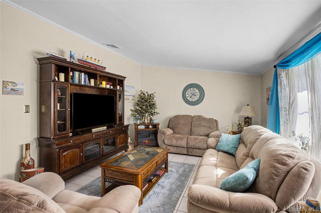 9 S Pond Trail, Ridge, NY 11961