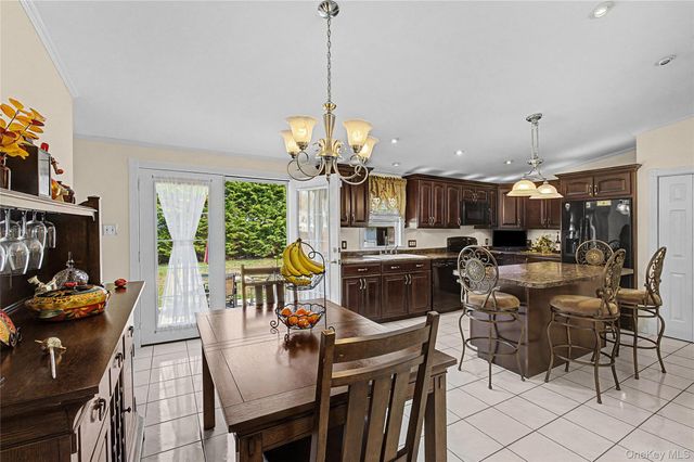 9 S Pond Trail, Ridge, NY 11961