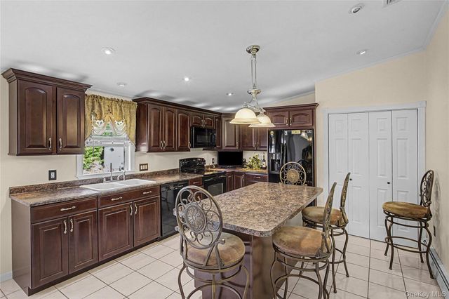 9 S Pond Trail, Ridge, NY 11961