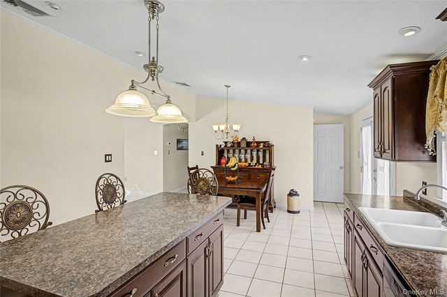 9 S Pond Trail, Ridge, NY 11961