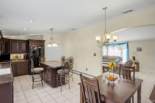 9 S Pond Trail, Ridge, NY 11961