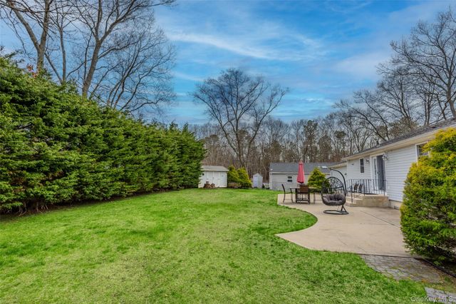 9 S Pond Trail, Ridge, NY 11961