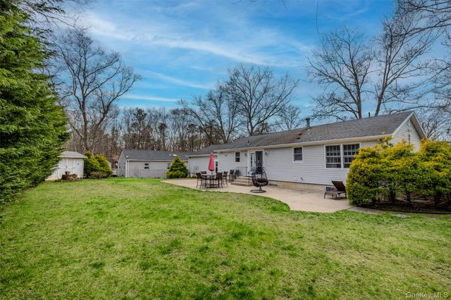 9 S Pond Trail, Ridge, NY 11961