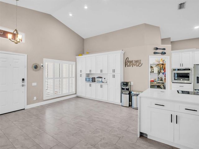 1703 BLUE LAKE COURT, Tarpon Springs, FL 34689