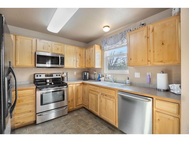 8461 Pebble Ct, Wellington, CO 80549