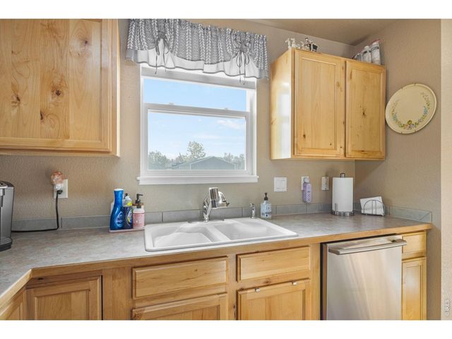 8461 Pebble Ct, Wellington, CO 80549