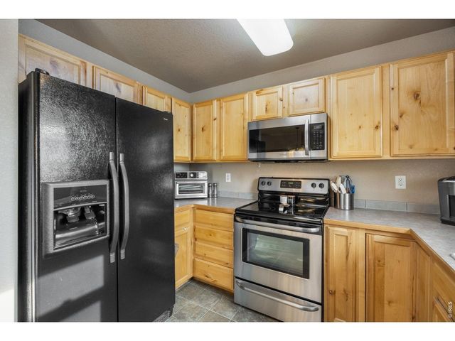8461 Pebble Ct, Wellington, CO 80549