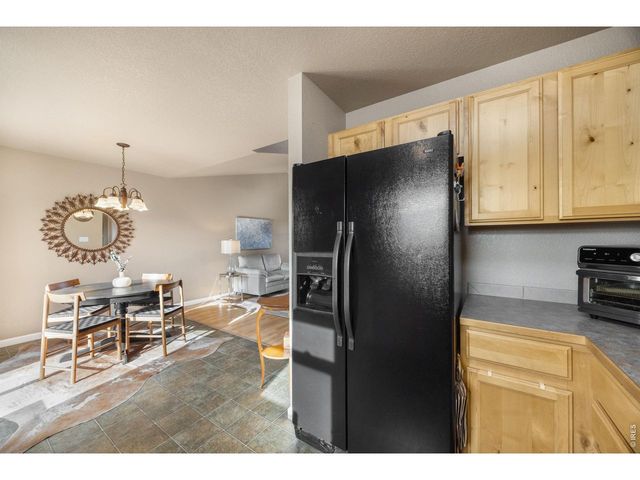 8461 Pebble Ct, Wellington, CO 80549