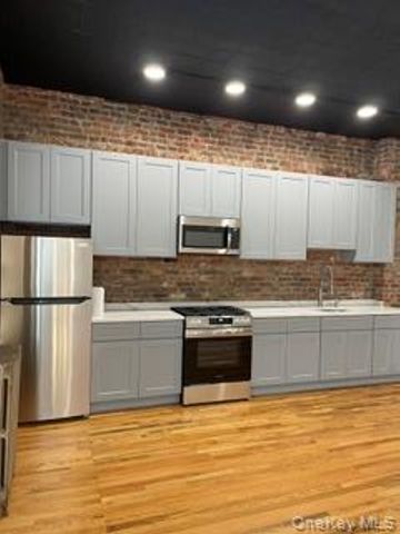 87-10 Liberty Avenue, Ozone Park, NY 11417
