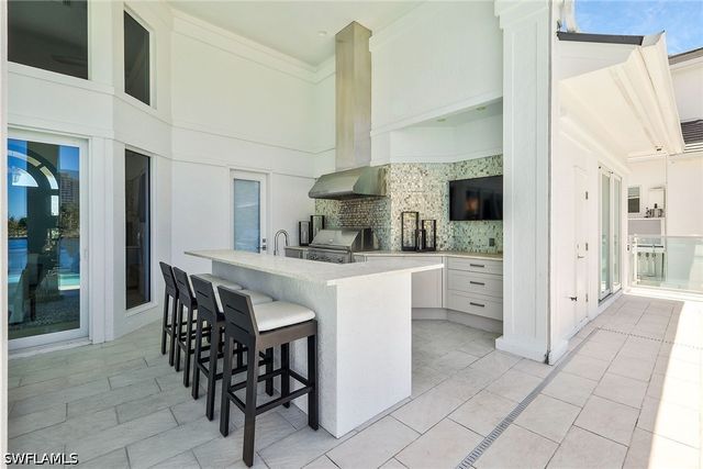 311 Neapolitan WAY, Naples, FL 34103