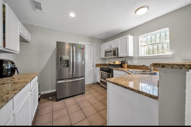 1027 Rain Forest Drive, Dallas, TX 75217