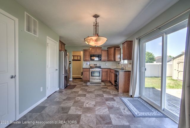 60 Lake Ridge Drive, Mason, MI 48854