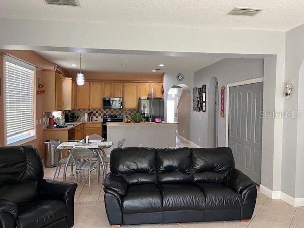 Image 58 of property listing at 9721 OLD PATINA WAY, Orlando, FL 32832